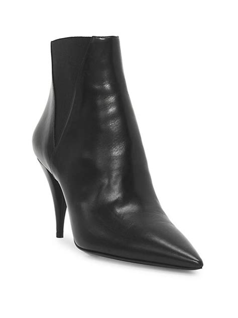 Shop Saint Laurent Kiki Leather Booties .